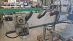Etiquetadora automtica de doble cabezal para botellas planas Bauch Campos