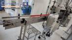 L�nea para llenado de salmuera, inserci�n manual de producto y taponado autom�tico
