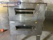 Horno transportador Lincoln de acero inoxidable para hornear galletas y pizza.