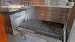 Horno transportador Lincoln de acero inoxidable para hornear galletas y pizza.
