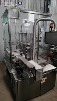 M�quina de llenado rotativa de acero inoxidable para l�quidos IMA F540, 24.000 botellas por hora.