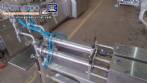 M�quina llenadora con 2 boquillas para l�quidos y enroscador de tap�n pilfer