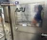 T�nel de enfriamiento con m�quina de recubrimiento y tanque de fusi�n de chocolate AFJ 2024