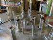 Llenadora rotativa gravimtrica de acero inoxidable con cabina