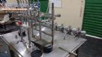 Llenadora lineal con sistema de llenado de 6 pistones