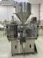 Llenadora dosificadora volum�trica con selladora y taponadora en acero inoxidable Delgo 2000 botes por hora