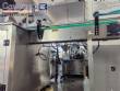 M�quina autom�tica de sellado y taponado de latas Hualian Machinery