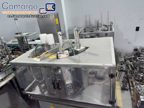 Máquina dosificadora rotativa automática con selladora para vasos Delgo, 3500 vasos por hora. Máquina dosificadora rotativa automática con selladora para vasos Delgo, 3500 vasos por hora.